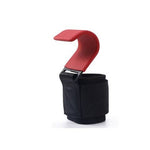 Black ankle strap with red buckle on a white background