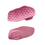 Two pink silicone foot pads on a white background
