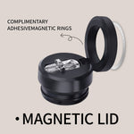 Black magnetic lid with clear adhesive magnetic rings on a beige background