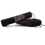 Black yoga mat and black carrying bag on a white background