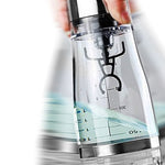 Clear plastic bottle with measurement markings on a blurred background