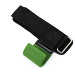 Black belt with a green buckle on a white background