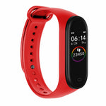 Red smartwatch with a black screen on a white background